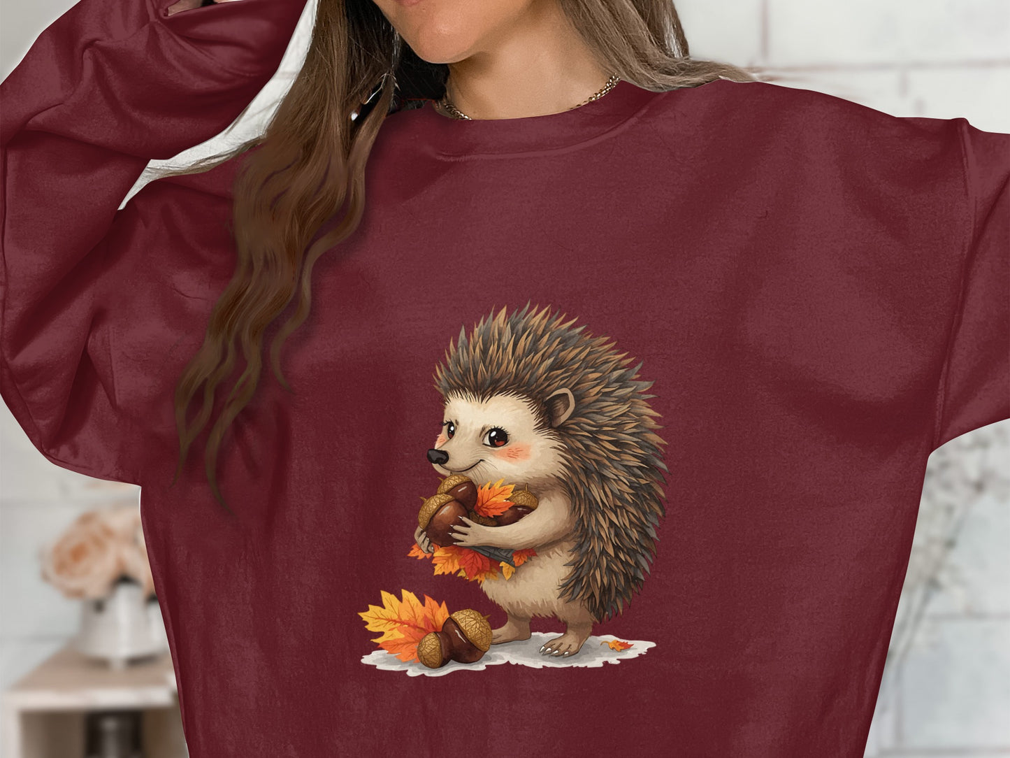 Cozy Autumn Hedgehog Holding Acorns Graphic Sweatshirt product type
