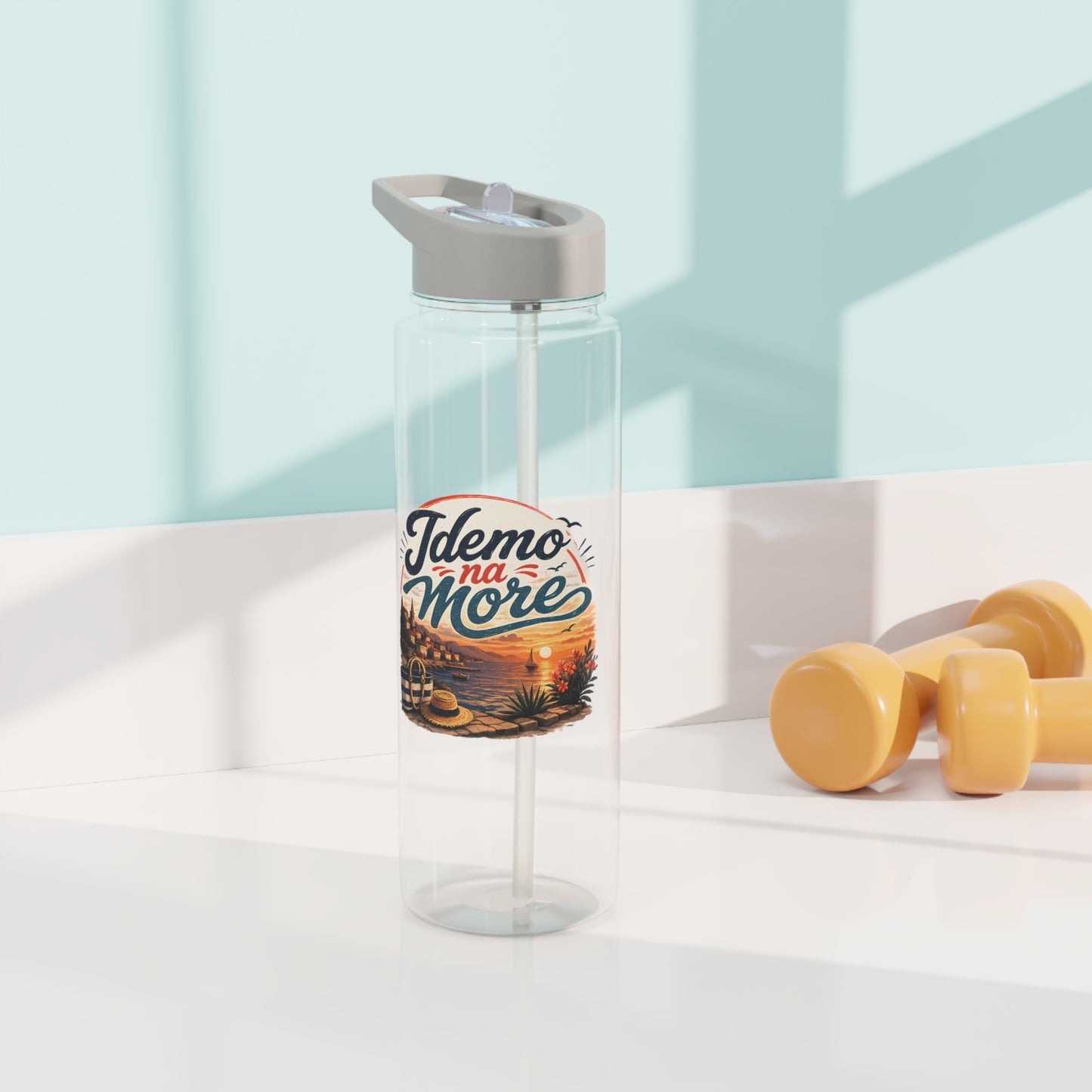 Clear water bottle with straw and "Idemo na More" text over a seaside sunset graphic.