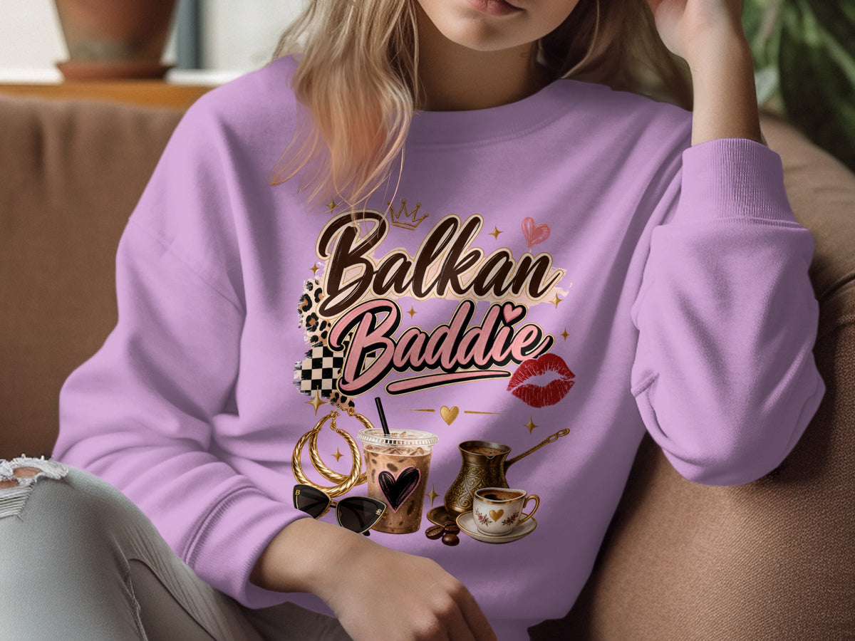 Purple sweatshirt with "Balkan Baddie" graphic and coffee shop elements.