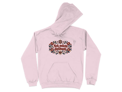Light pink hoodie featuring red text that says Nek puknu dušmani surrounded by folkloric floral embroidery.