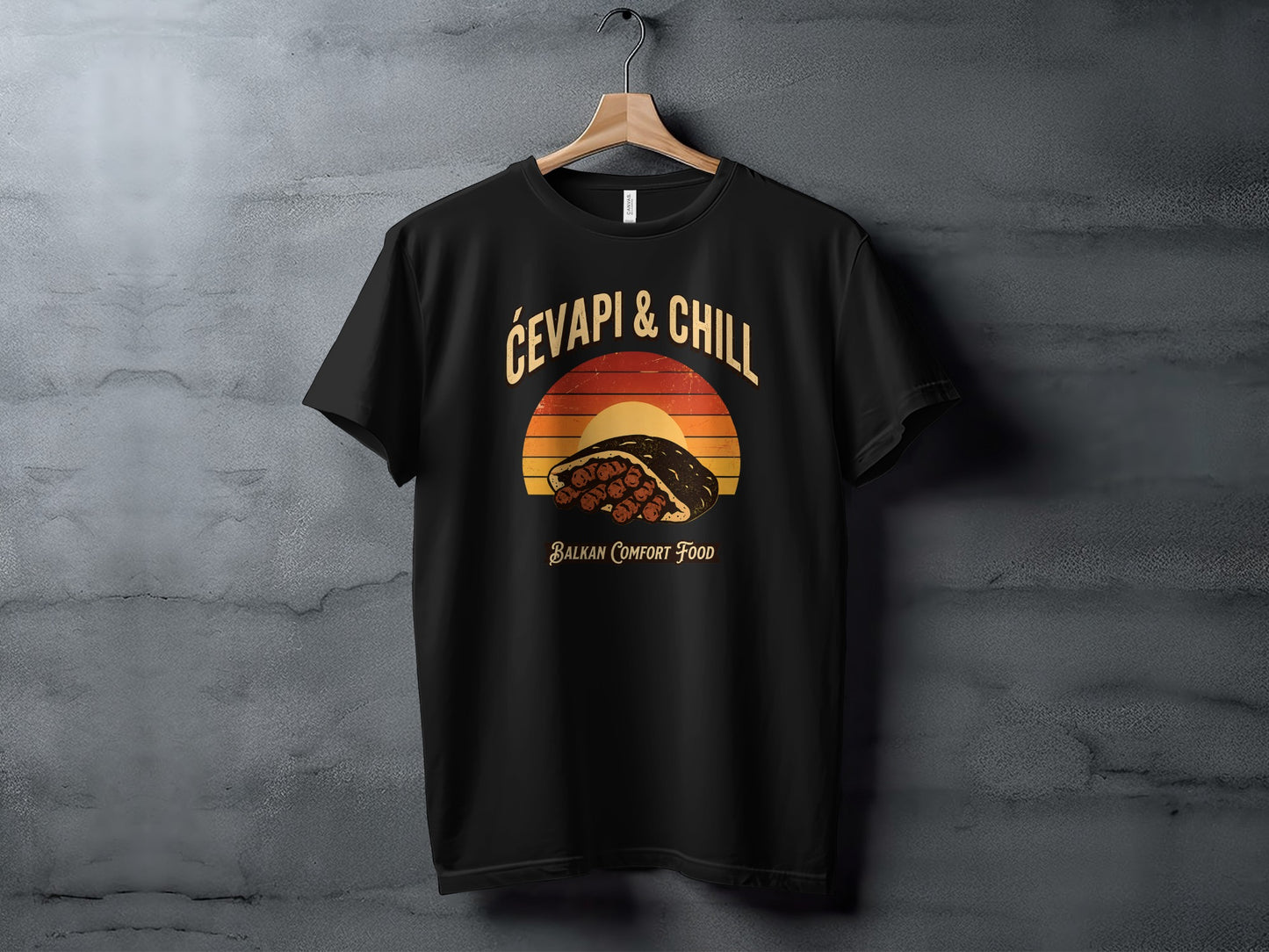 Black t-shirt with "Ćevapi & Chill Balkan Comfort Food" graphic.
