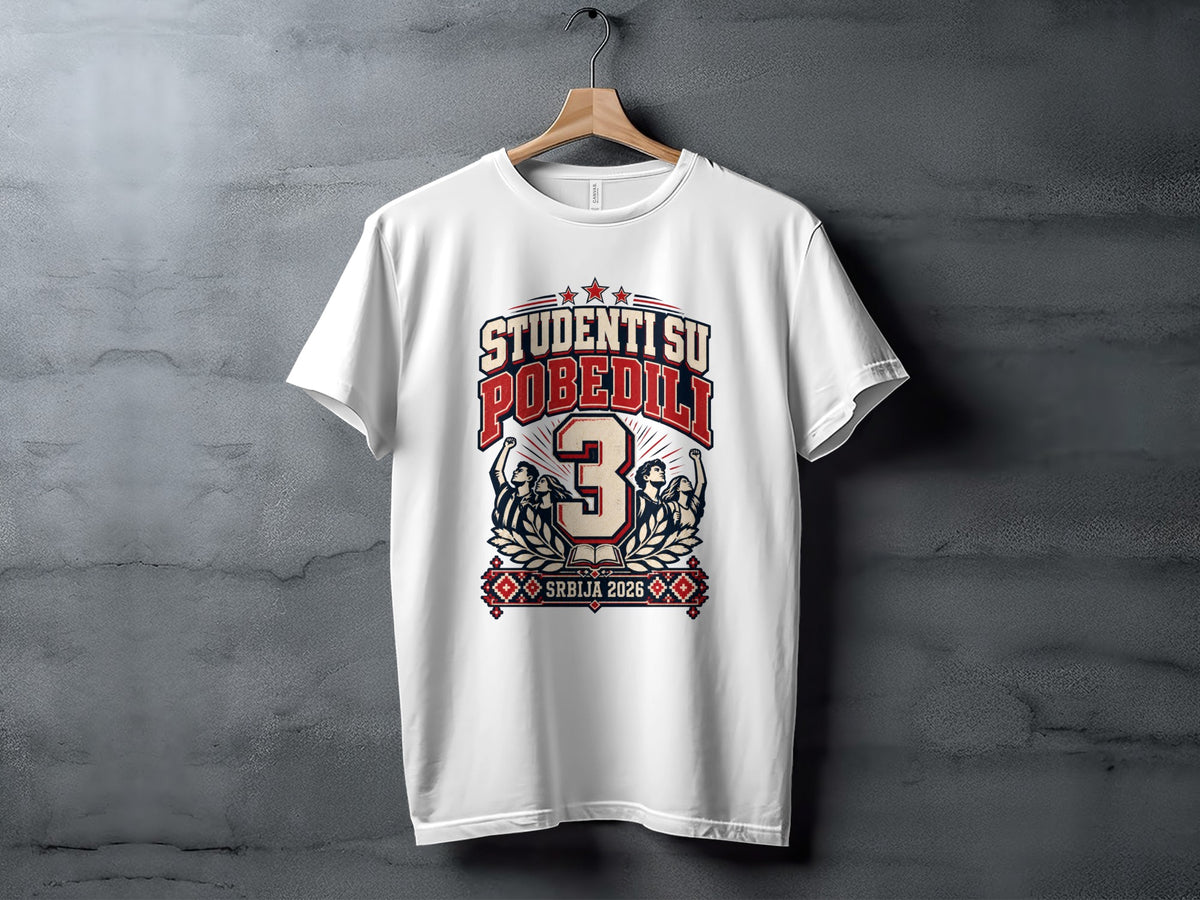 White t-shirt hanging on a textured wall, featuring a red and blue graphic with students and text.