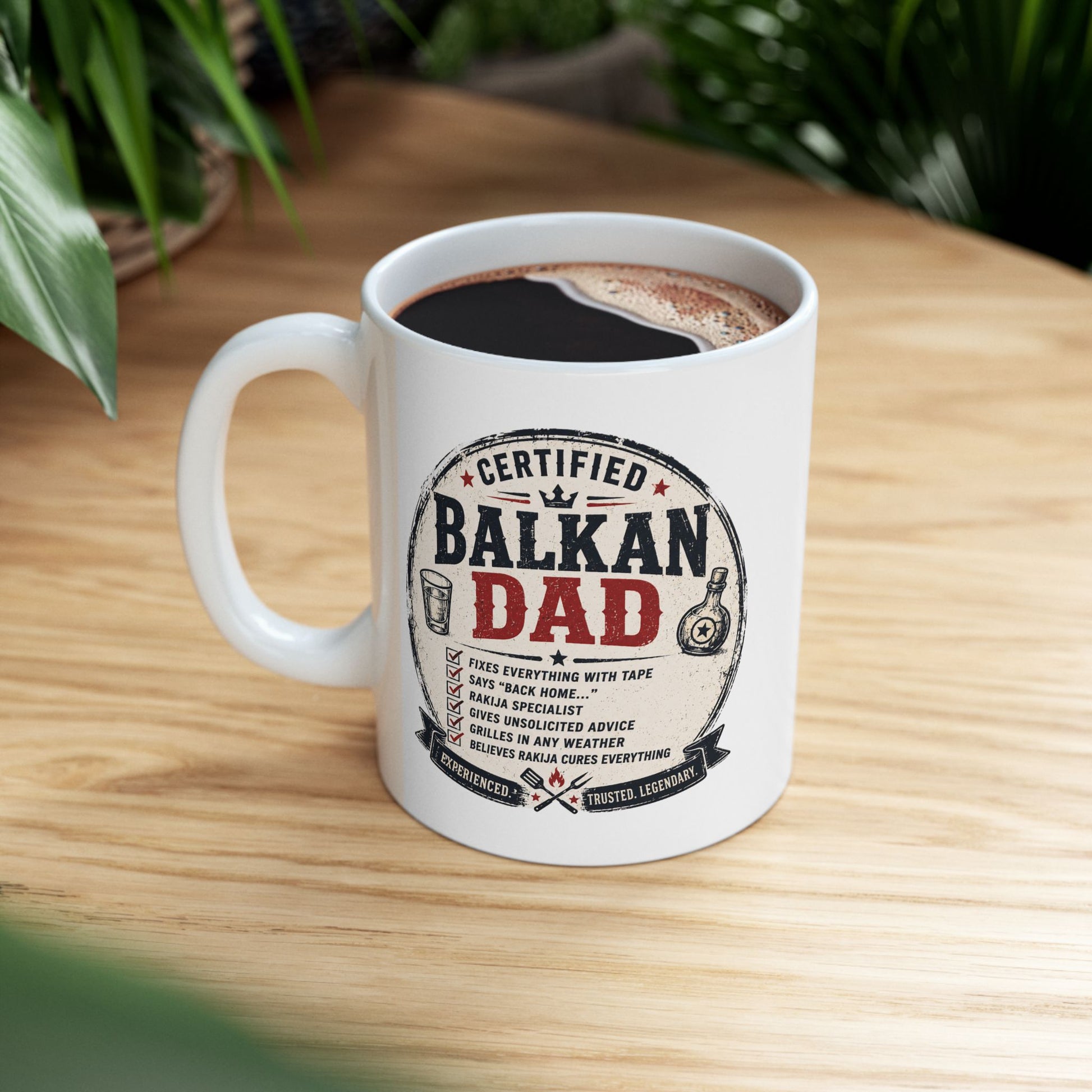 White mug with "Certified Balkan Dad" text and graphic design.