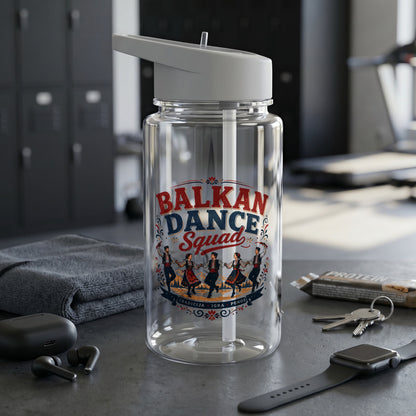Clear water bottle with "Balkan Dance Squad" logo, gym setting and accessories.