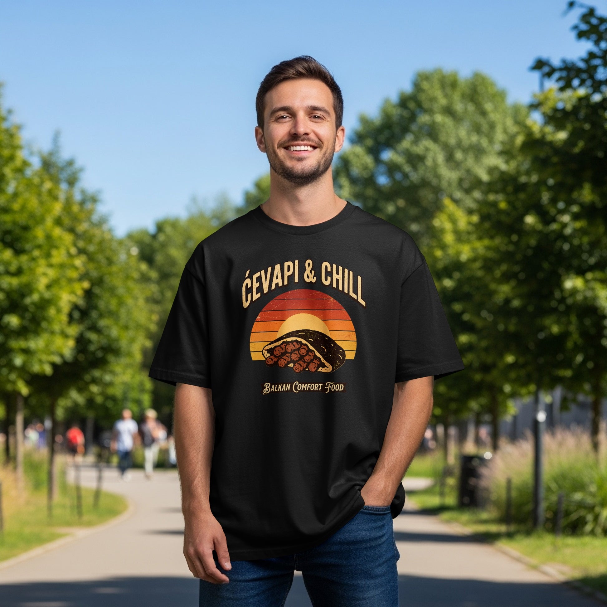 Black t-shirt with "Ćevapi & Chill Balkan Comfort Food" text and graphic.