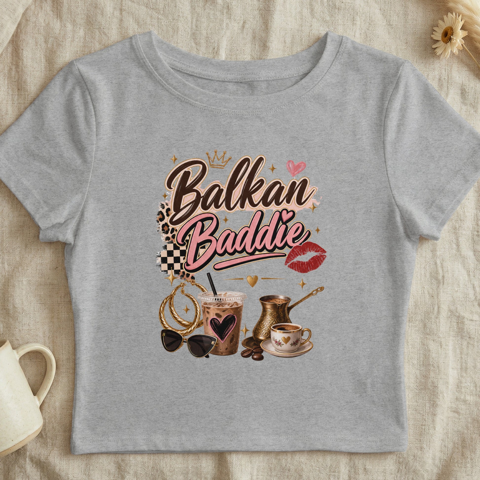 Grey t-shirt with "Balkan Baddie" text, coffee cup, cezve, and accessories.