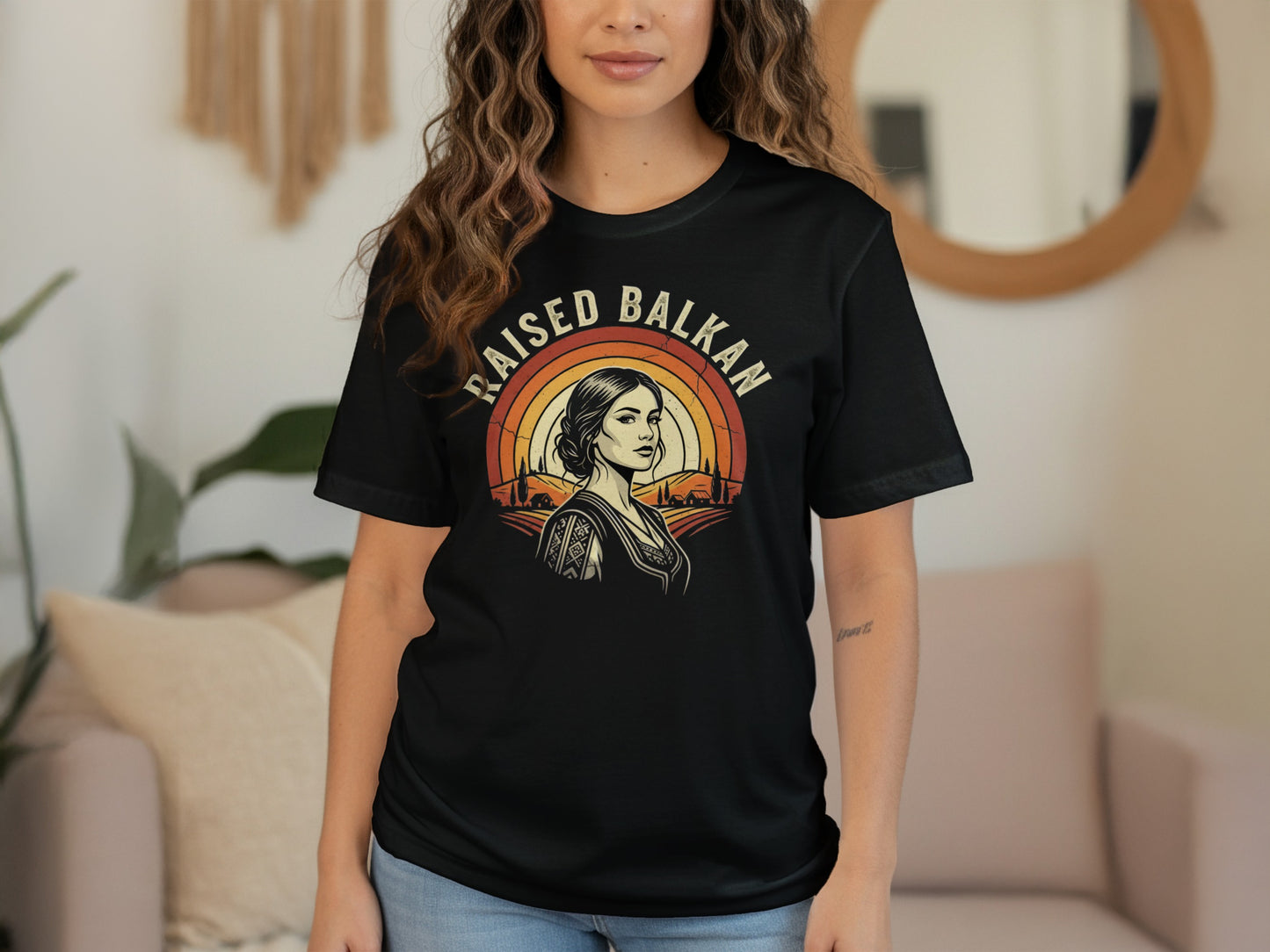 Black t-shirt with "Raised Balkan" text and a woman's portrait.