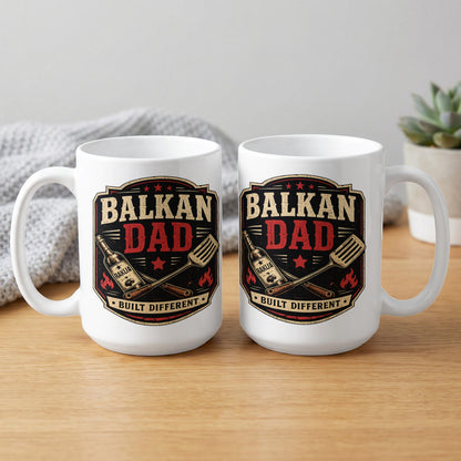 Two white mugs with "Balkan Dad Built Different" in a shield emblem.