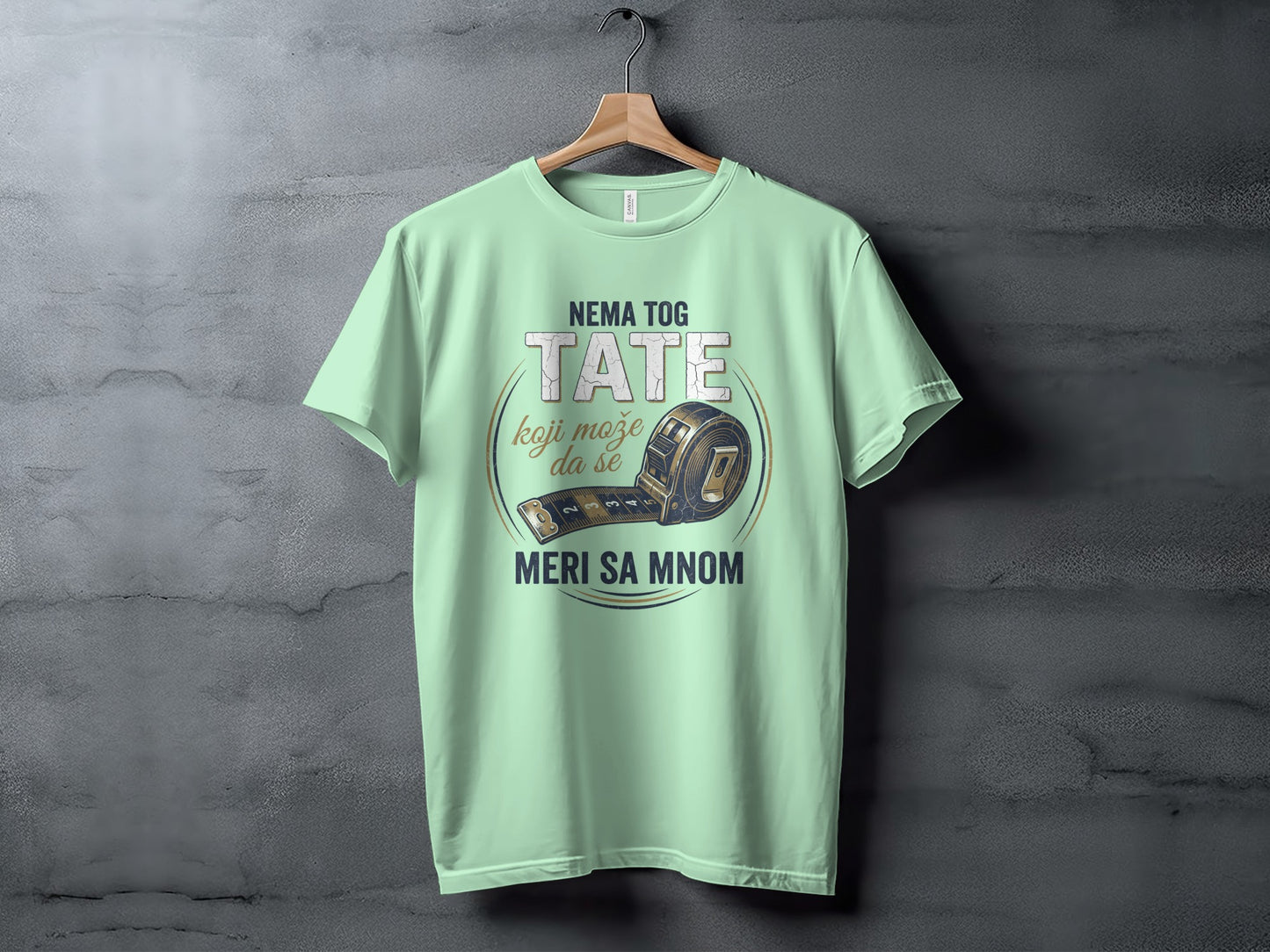 Light green t-shirt with measuring tape and "NEMA TOG TATE" text.