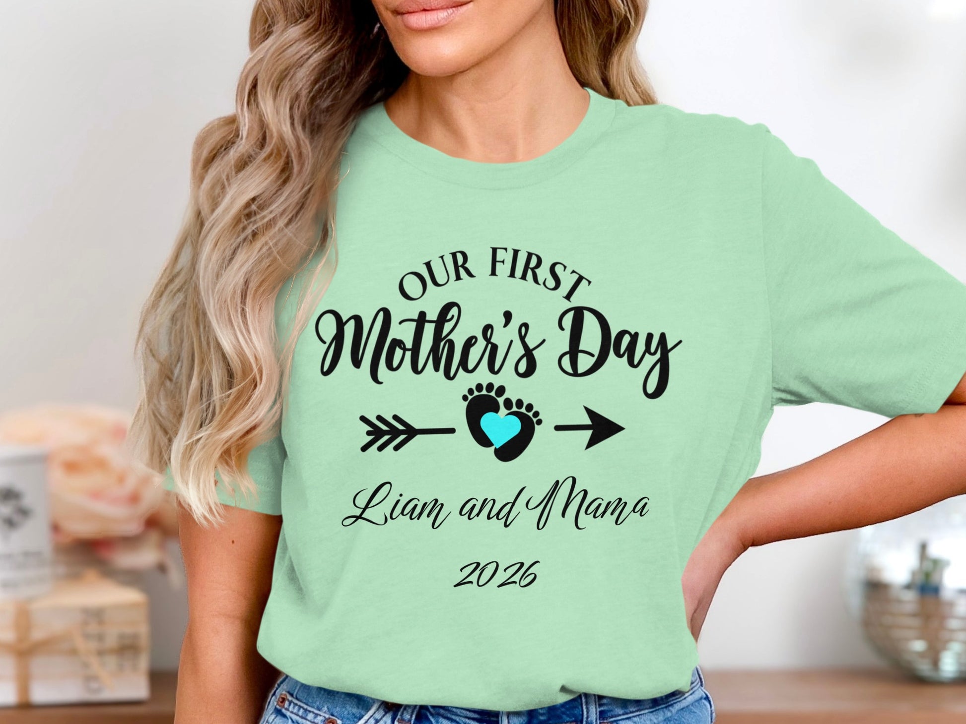 Mint green t-shirt with "Our First Mother's Day Liam and Mama 2026" text.