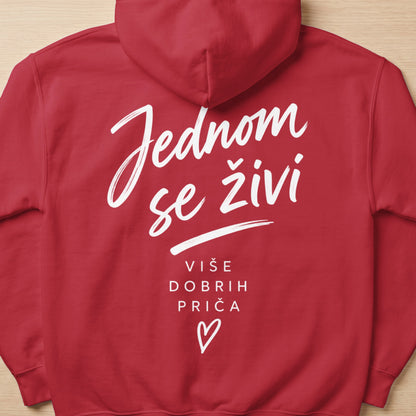 Red hoodie with white text "Jednom se živi Više dobrih priča" and a heart.
