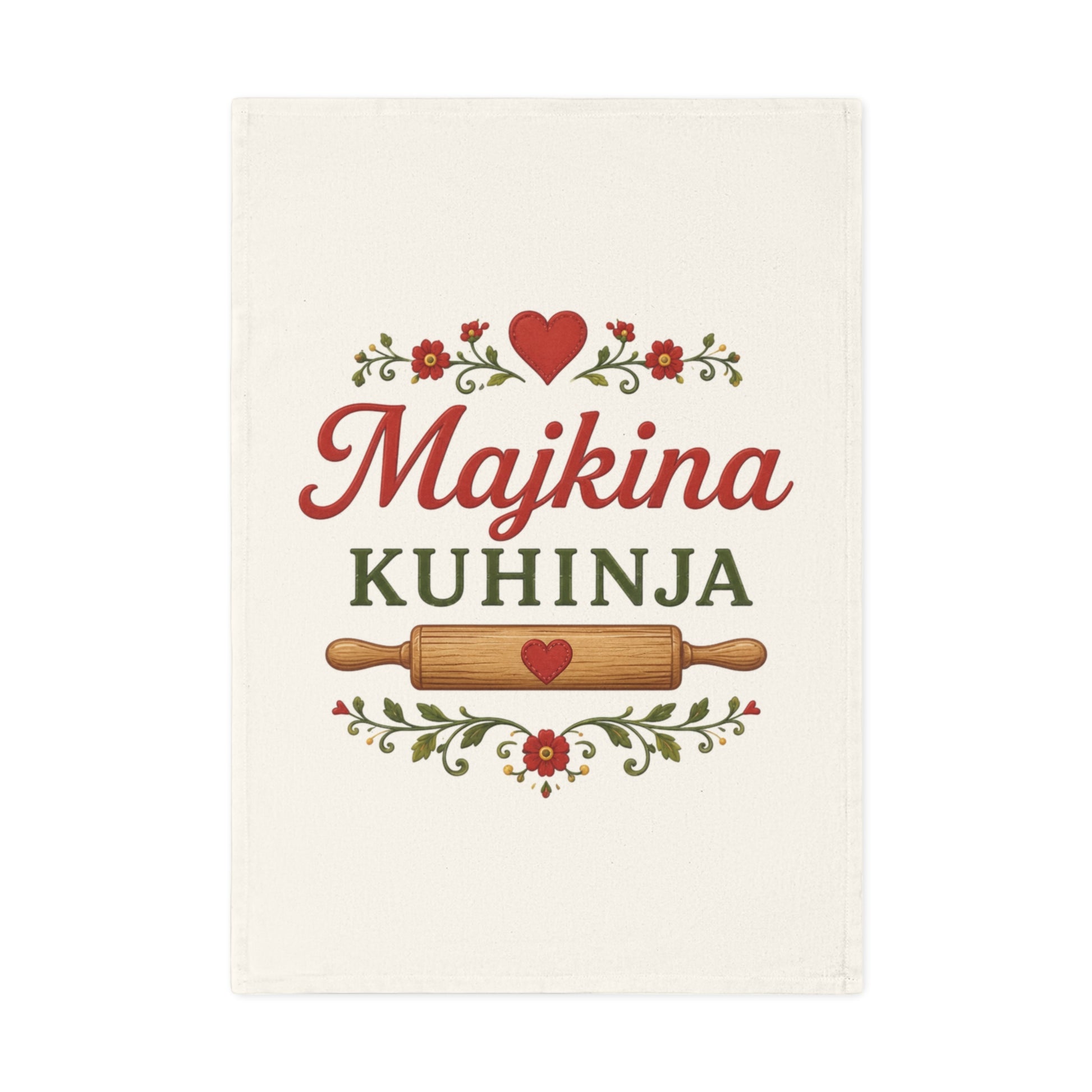 Tea towel with red script "Majkina" and green text "KUHINJA" over rolling pin.