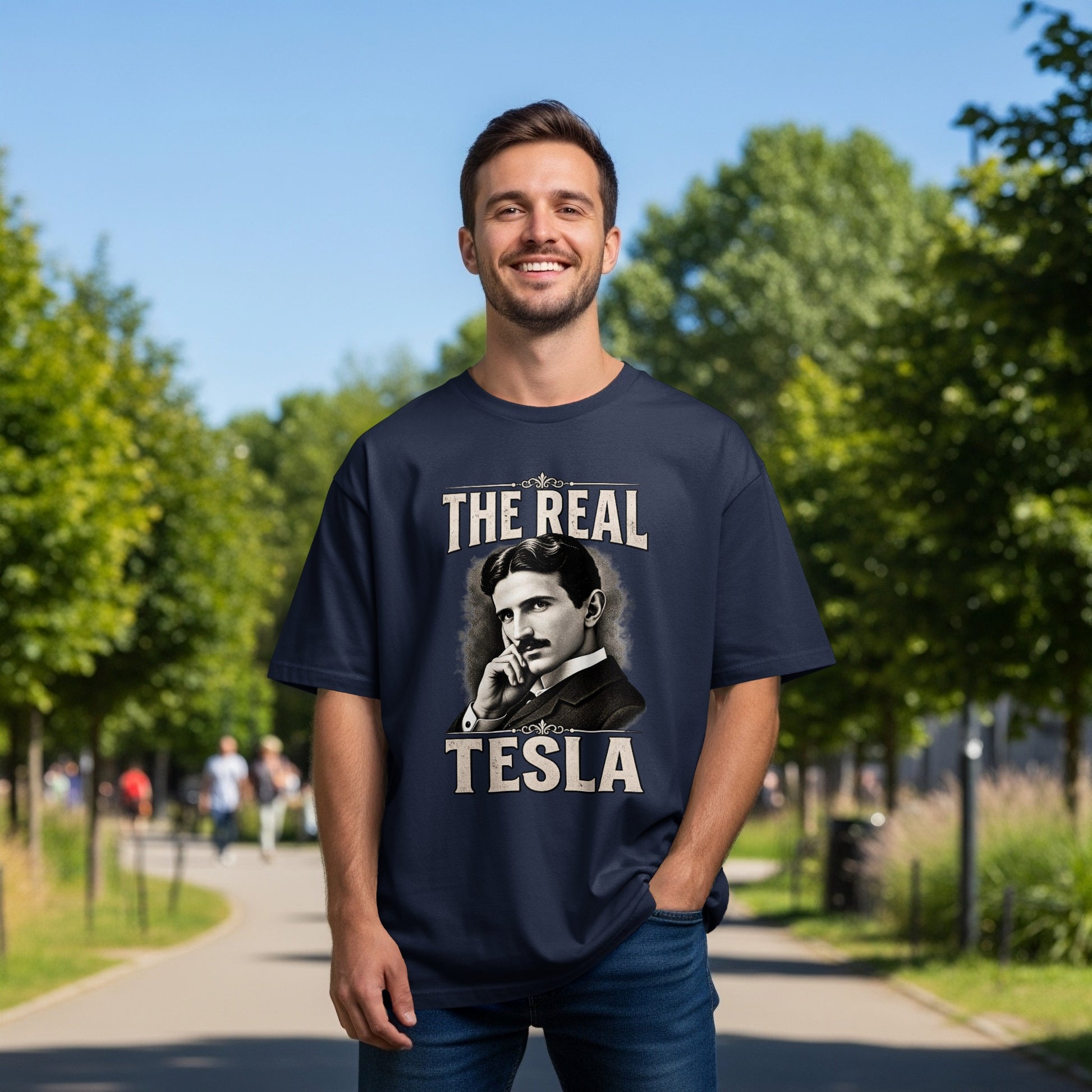 Navy t-shirt with portrait of Nikola Tesla and text "THE REAL TESLA".