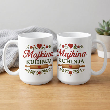 Two white mugs with a rolling pin, hearts, and floral designs, printed with "Majkina Kuhinja".