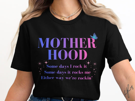 Black t-shirt with "MOTHER HOOD" in gradient text and lyrics below.