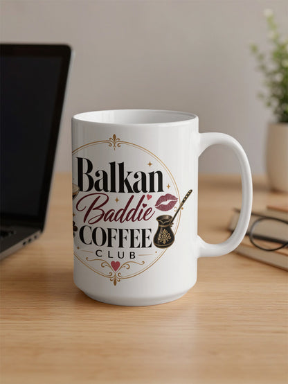 White mug with "Balkan Baddie Coffee Club" text and a kiss.