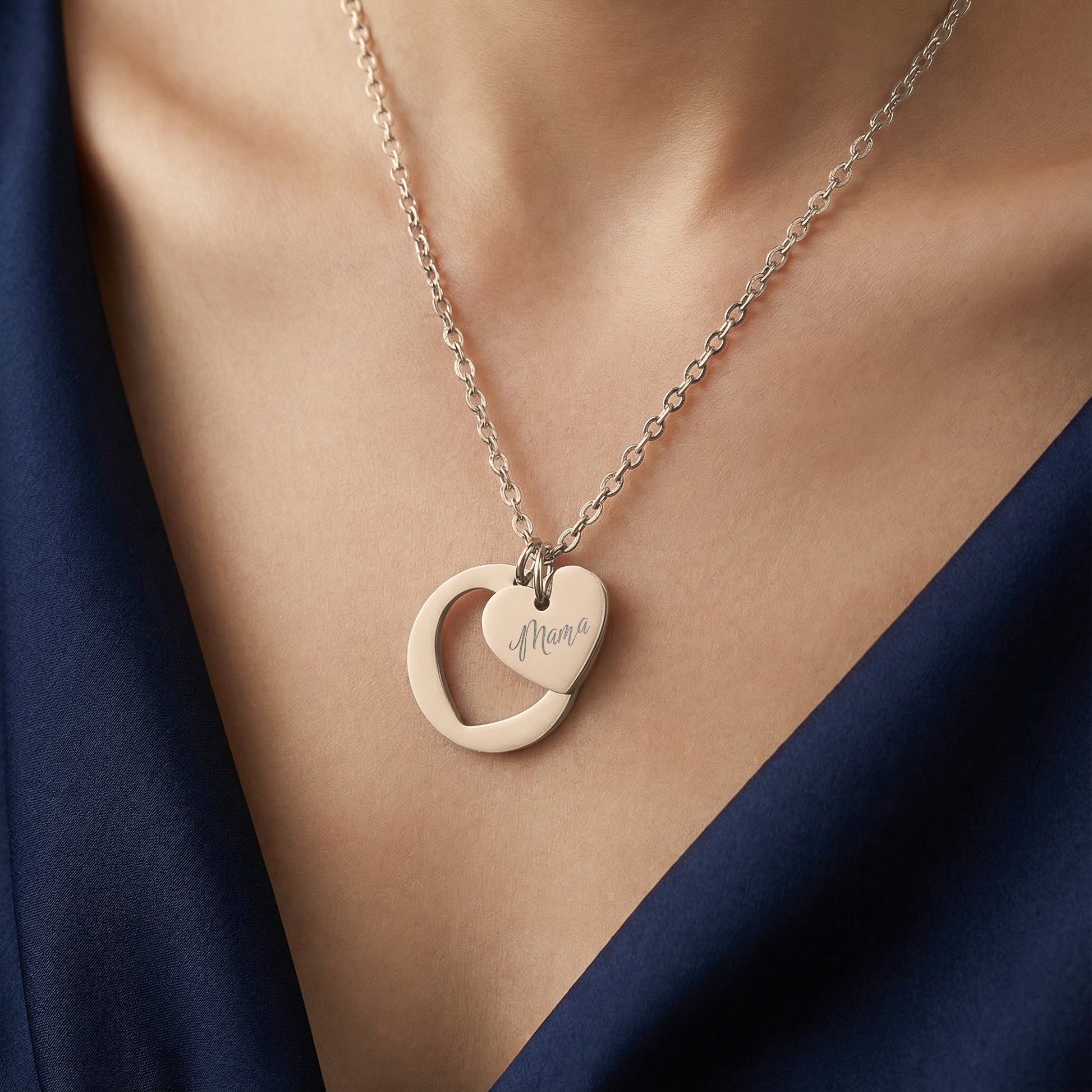 Rose gold necklace with heart pendant inscribed with "Mama".