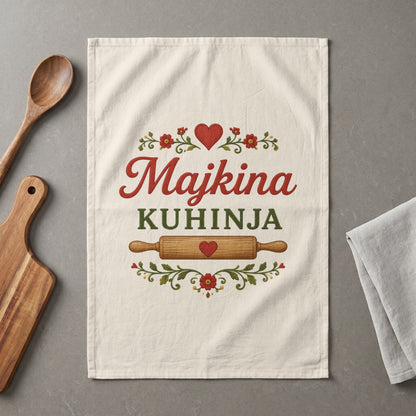 Towel with "Majkina KUHINJA" text, heart, rolling pin, and floral accents.