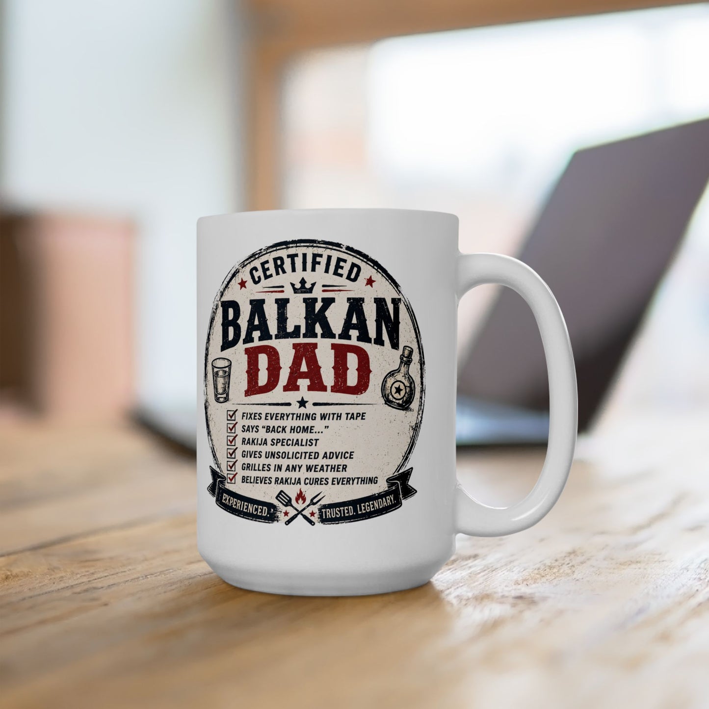 Certified Balkan Dad mug with humorous list of qualities and 'Rakija Specialist' title.