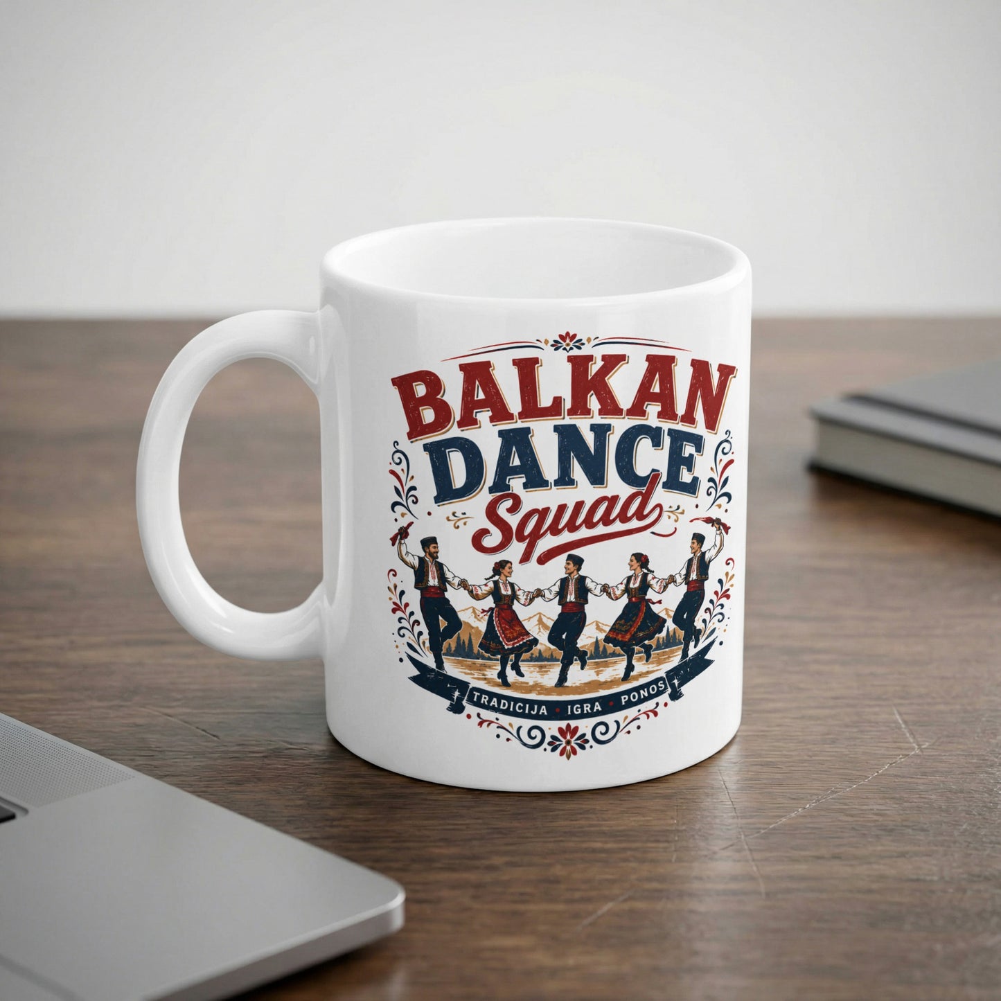 White mug with "Balkan Dance Squad" text and dancing figures in traditional attire.