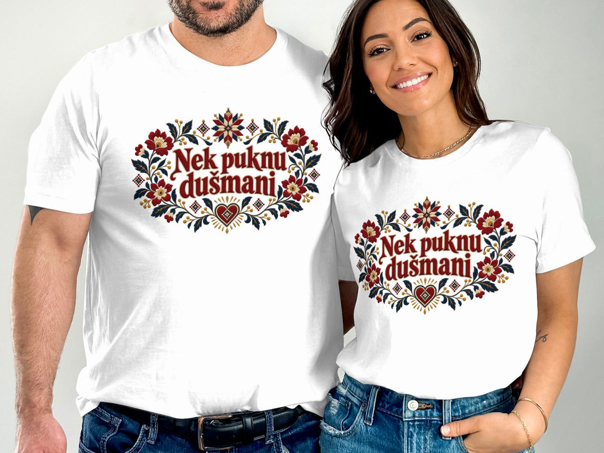 A man and a woman wear matching white t-shirts with floral prints and red lettering.