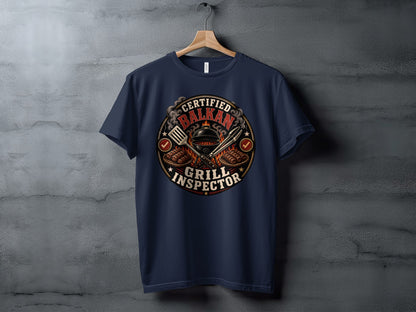 Navy t-shirt with "Certified Balkan Grill Inspector" circular emblem.