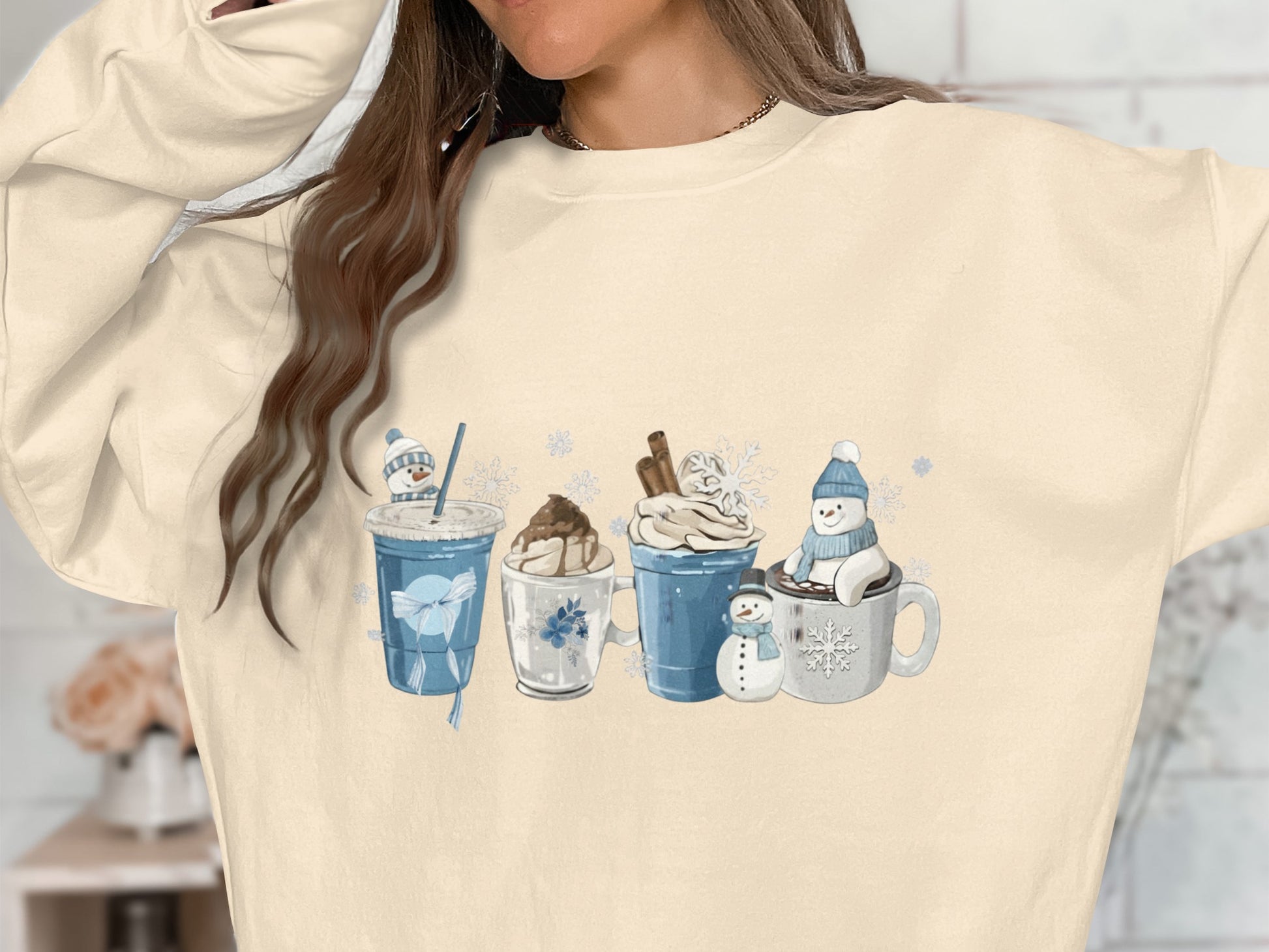Festive winter treats and snowman mug graphic sweatshirt