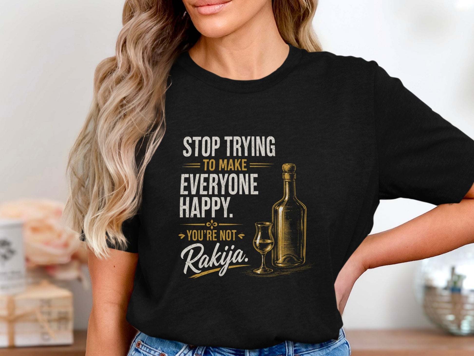 Black t-shirt with text "Stop trying to make everyone happy. You're not Rakija."