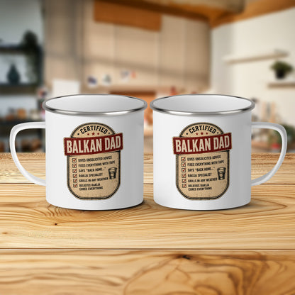 Two white enamel mugs with "Certified Balkan Dad" and checklist of traits.