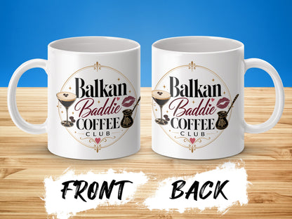 White mug with "Balkan Baddie Coffee Club" logo on front and back.