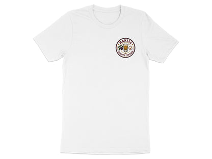 White t-shirt with circular logo reading "Rakija Quality Control".