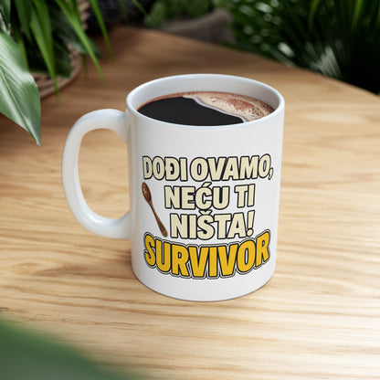 White mug with "DOĐI OVAMO, NEĆU TI NIŠTA! SURVIVOR" text and a spoon illustration.