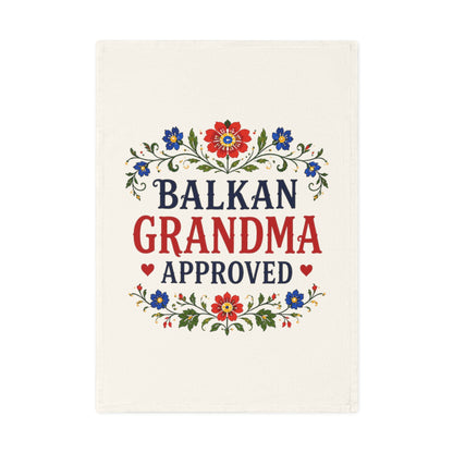 Balkan Grandma Approved text on a cream-colored cloth with floral accents.