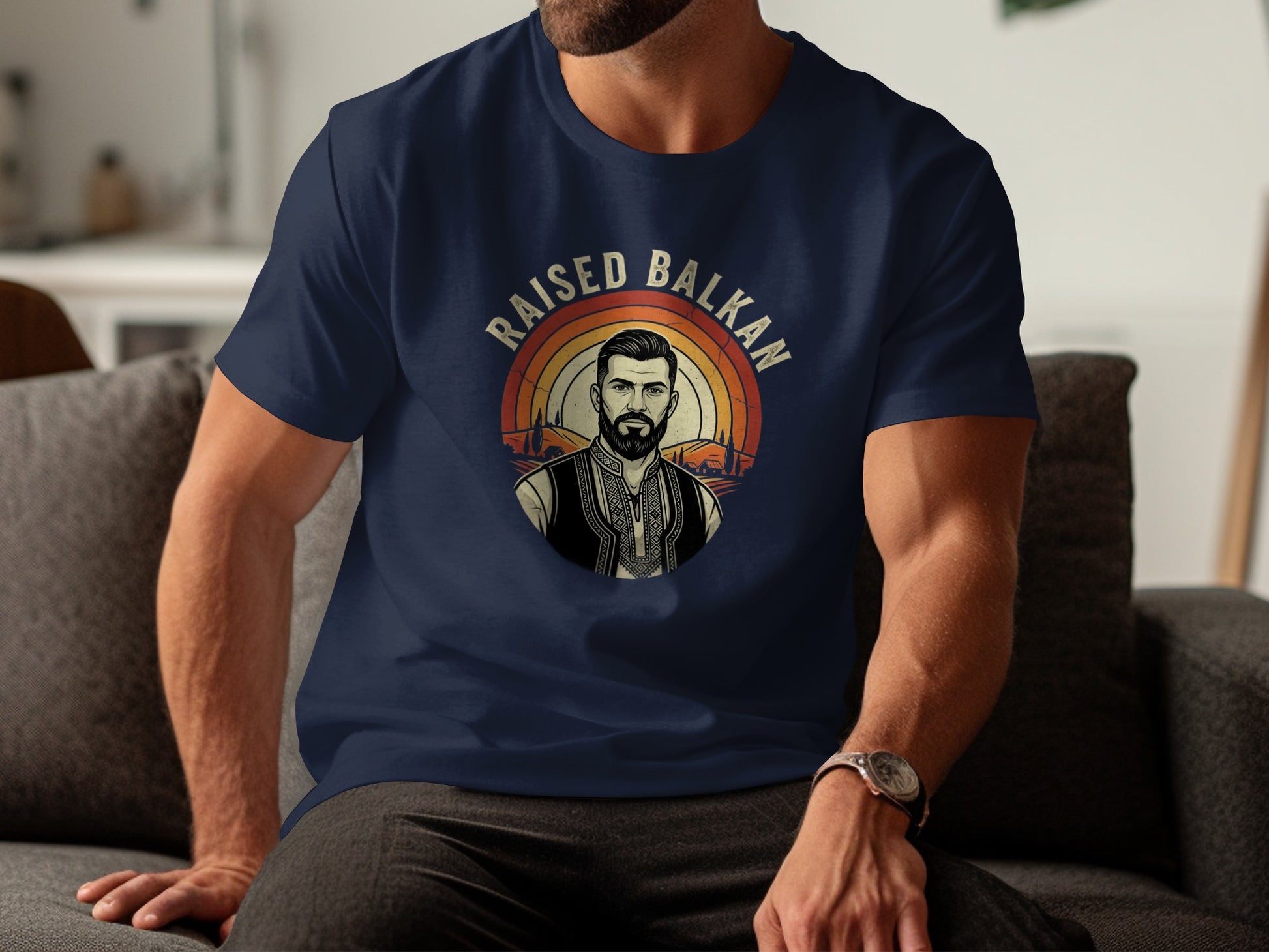 Navy t-shirt with "Raised Balkan" text above a man in traditional attire.
