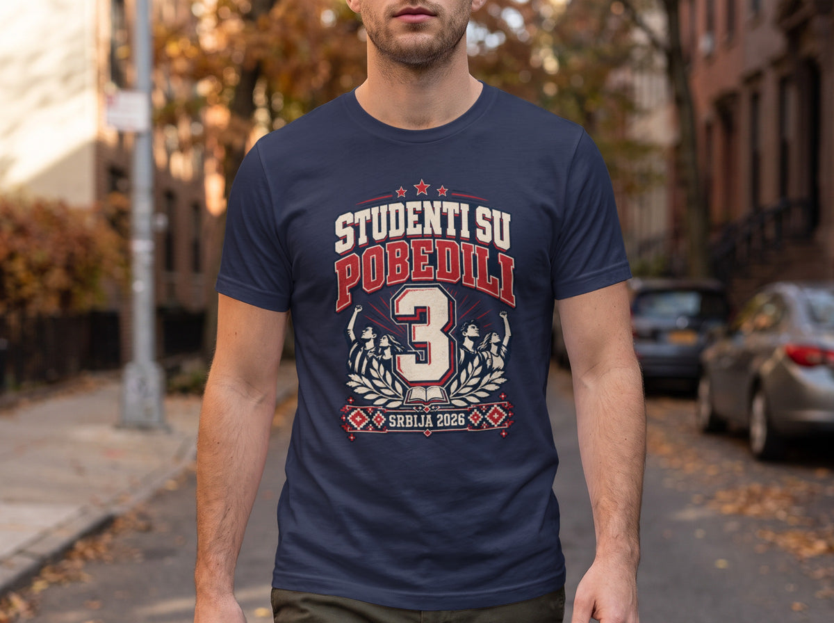 A man wearing a dark blue t-shirt featuring the graphic text "STUDENTI SU POBEDILI 3 SRBIJA 2026."