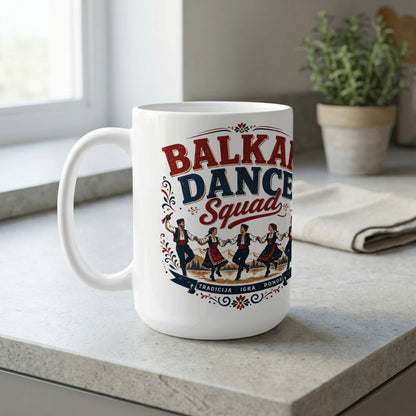 White mug with "Balkan Dance Squad" text and traditional dancers.