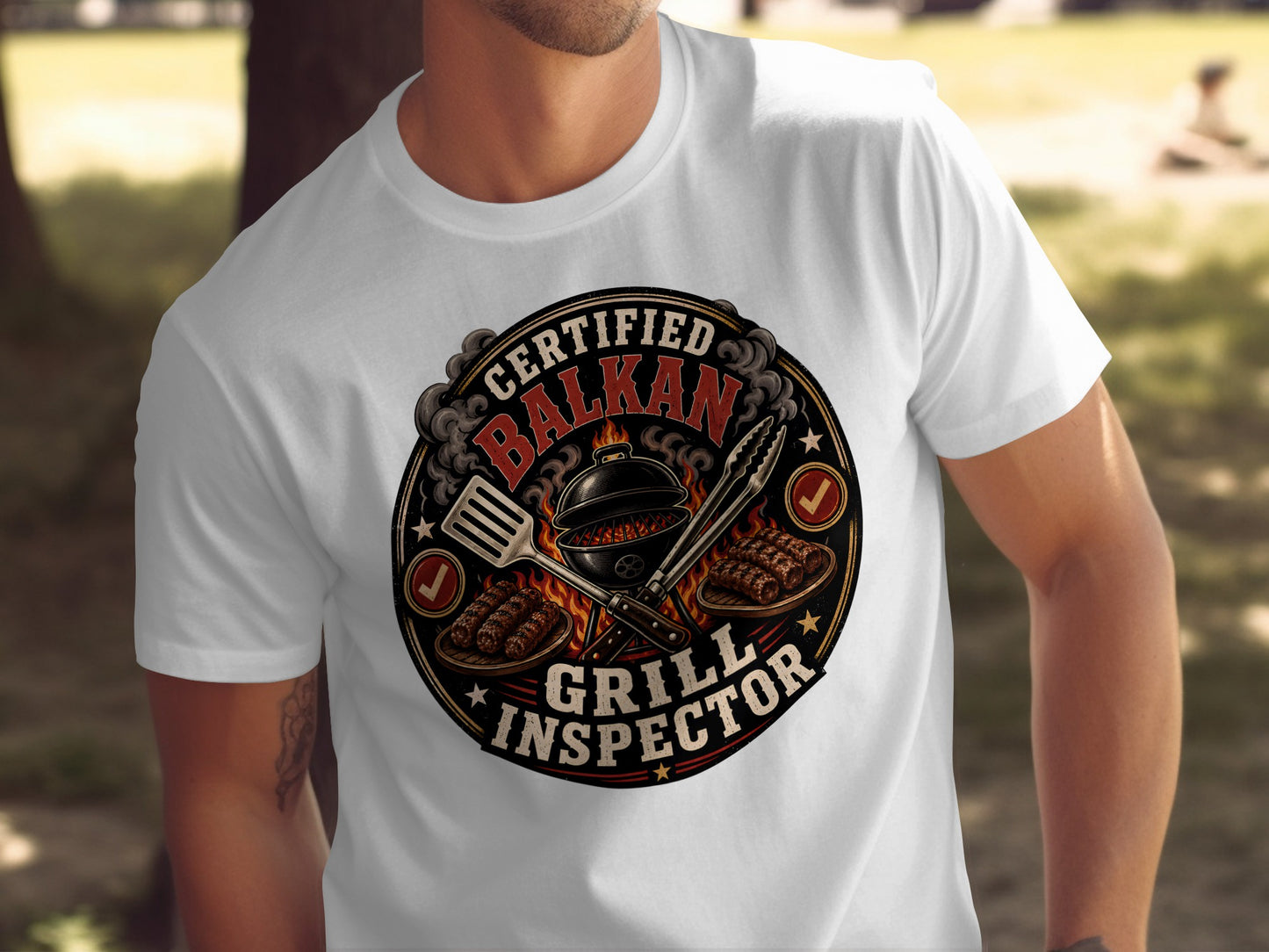 Certified Balkan Grill Inspector text on a t-shirt with grill and skewers.