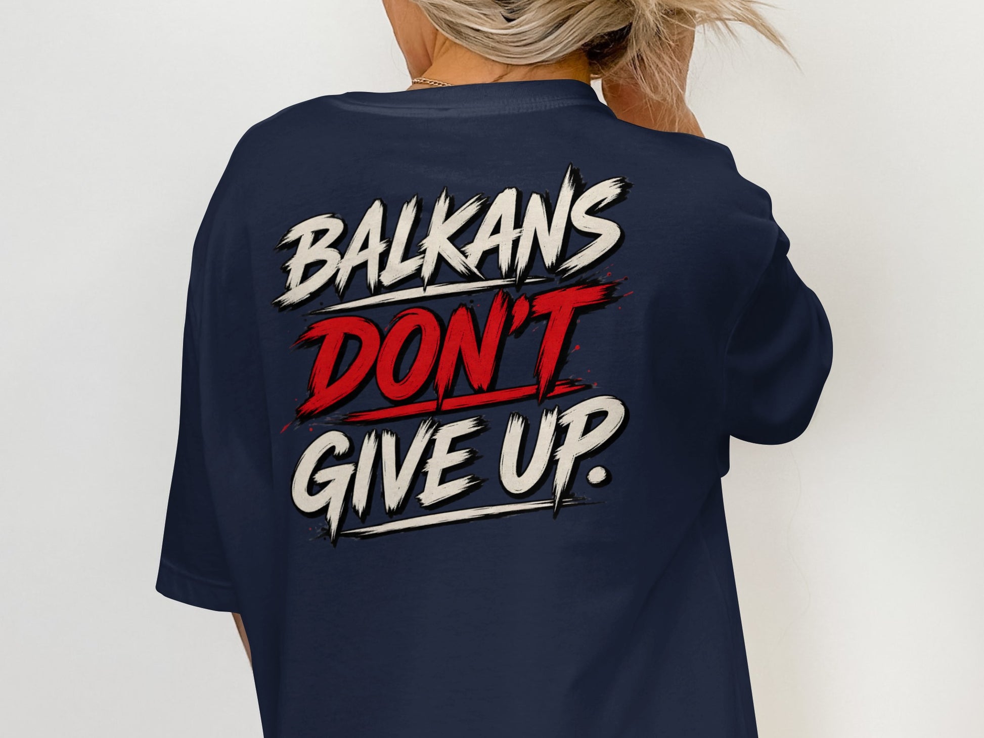 Navy t-shirt with "Balkans Don't Give Up" text design.