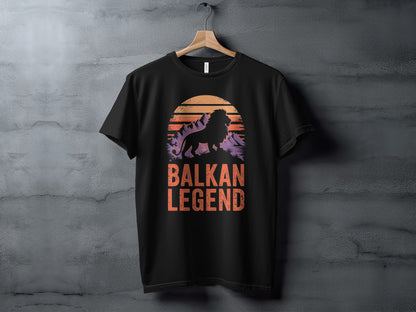 Black t-shirt with "Balkan Legend" text and a lion silhouette against a sunset.