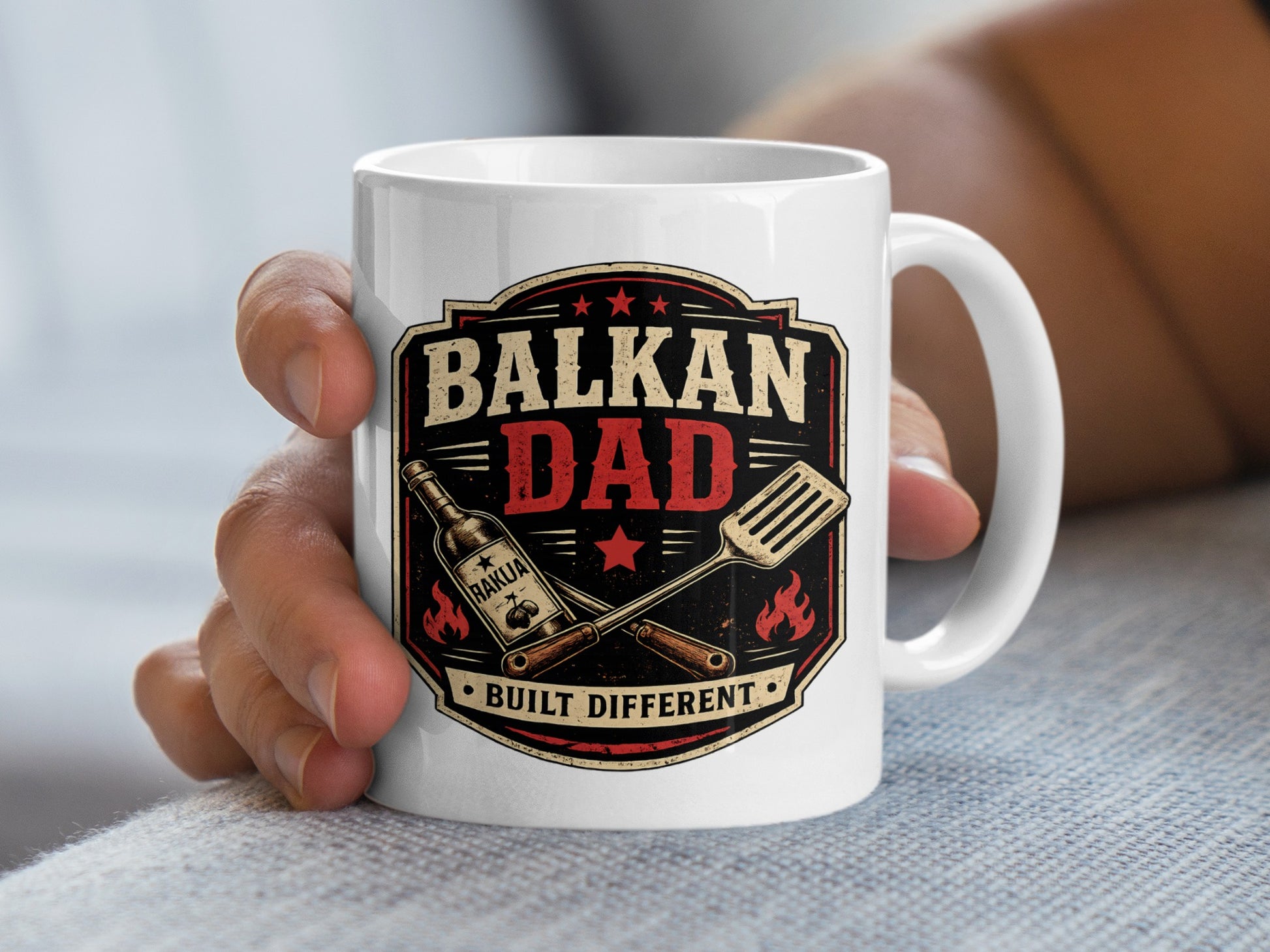 White mug with "Balkan Dad Built Different" text and grill tools.