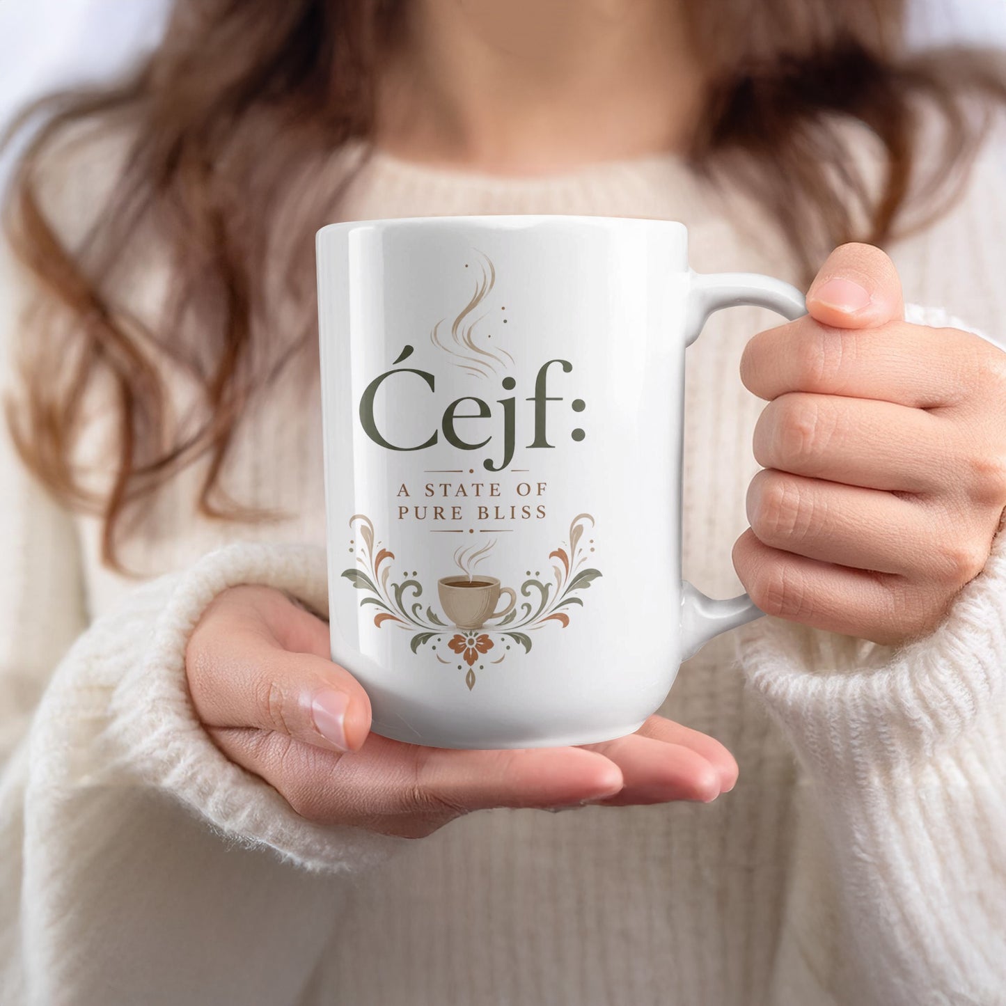 White mug with "Ćejf: a state of pure bliss" text and coffee cup design.