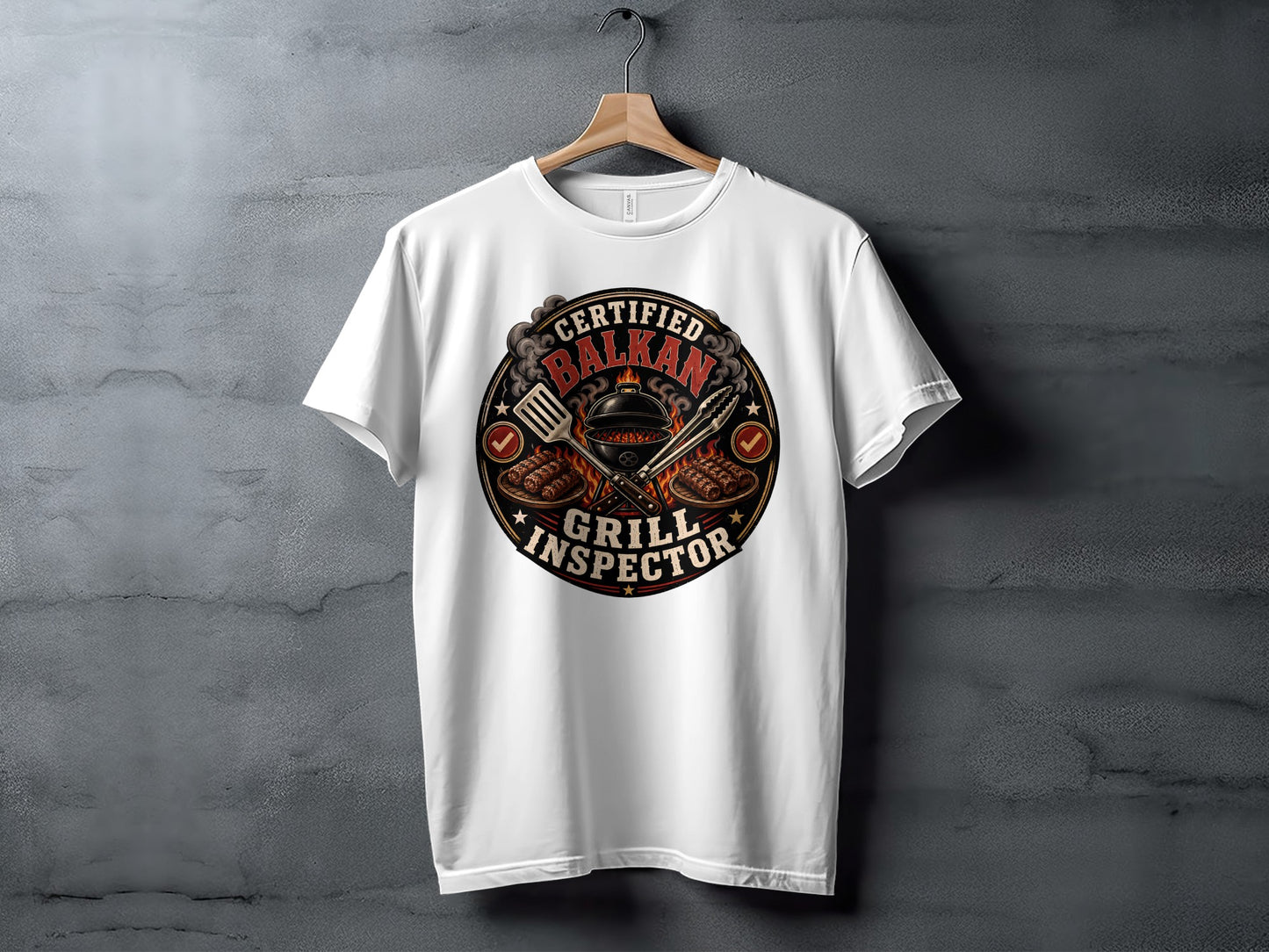 T-shirt with a circular logo featuring grilling tools and "Certified Balkan Grill Inspector".