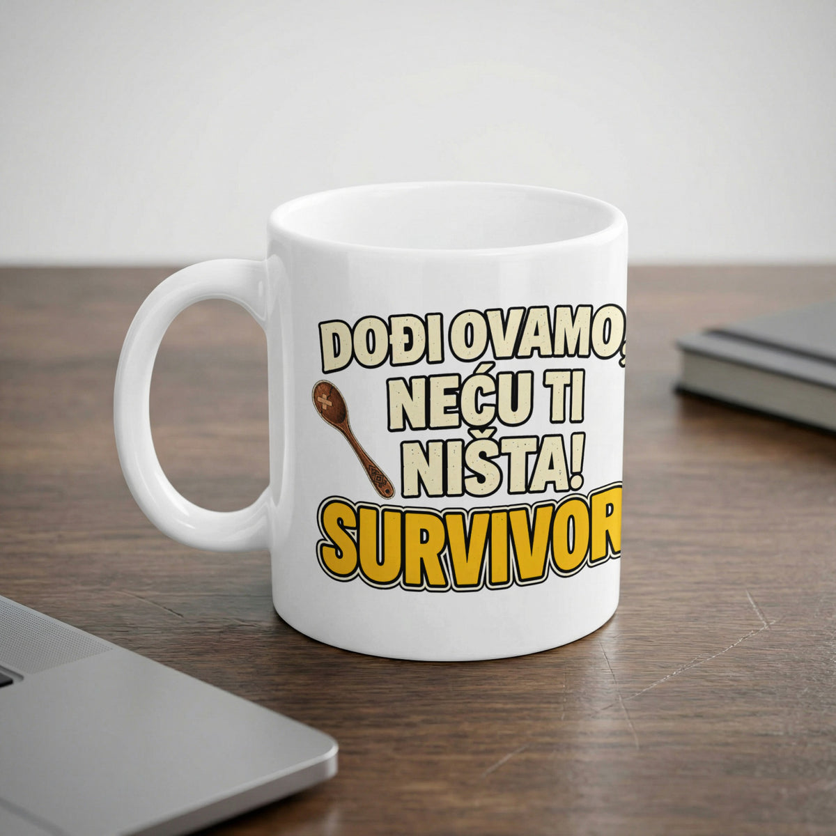White mug with text "DOĐI OVAMO NEĆU TI NIŠTA! SURVIVOR" and a spoon graphic.