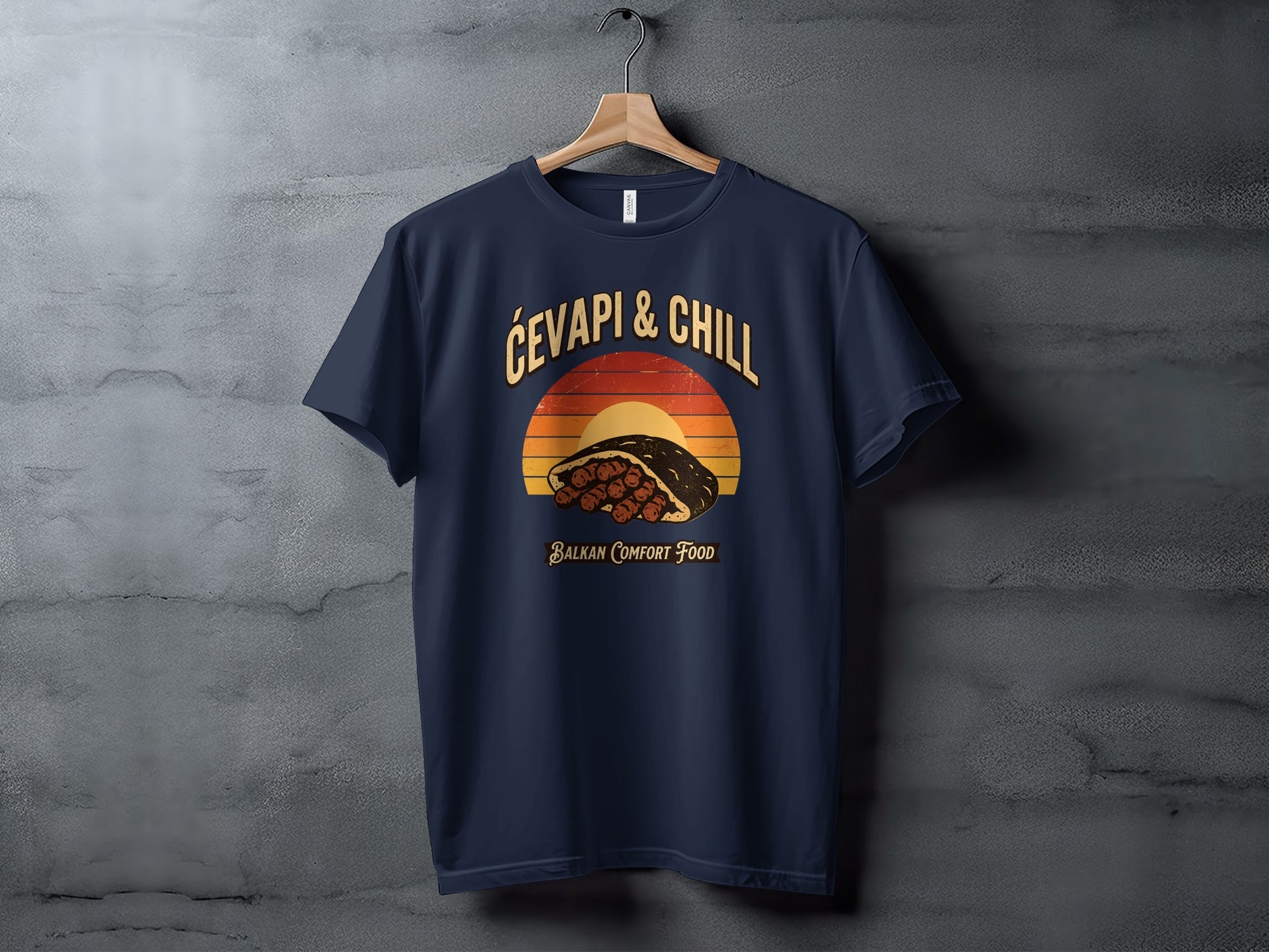 Dark blue t-shirt with "Ćevapi & Chill" design and "Balkan Comfort Food" text.