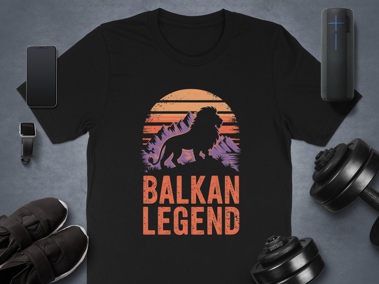Black t-shirt with Balkan Legend text and a lion silhouette at sunset.