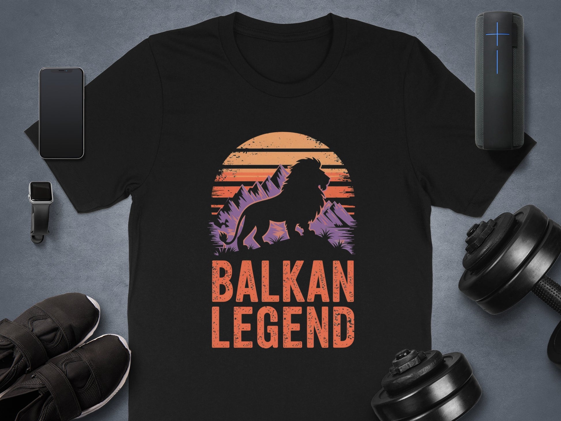 Black t-shirt with Balkan Legend text and a lion silhouette at sunset.