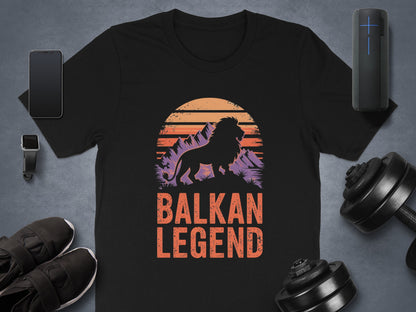 Black t-shirt with Balkan Legend text and a lion silhouette at sunset.