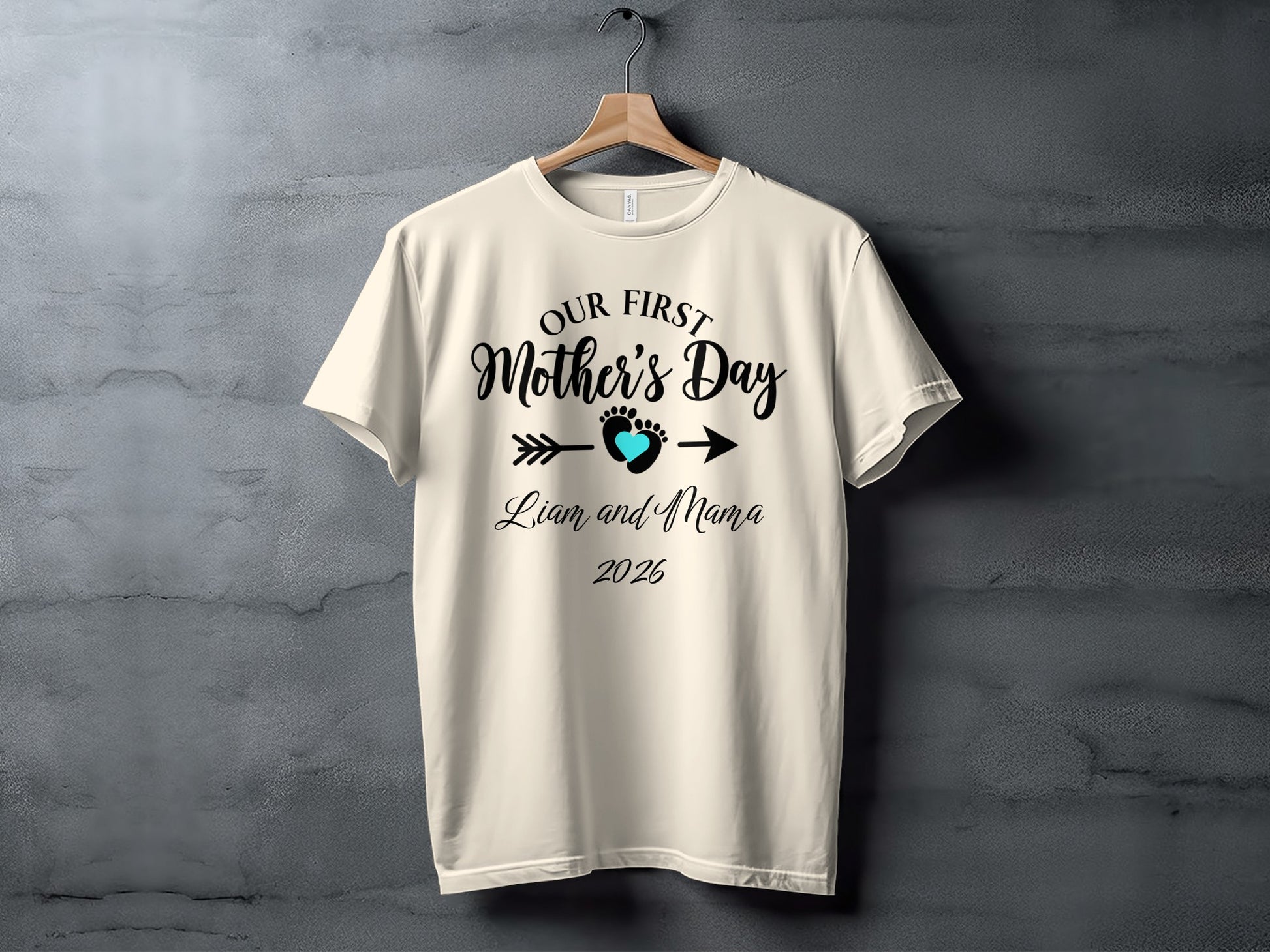 Cream t-shirt with "Our First Mother's Day" and "Liam and Mama 2025" text.