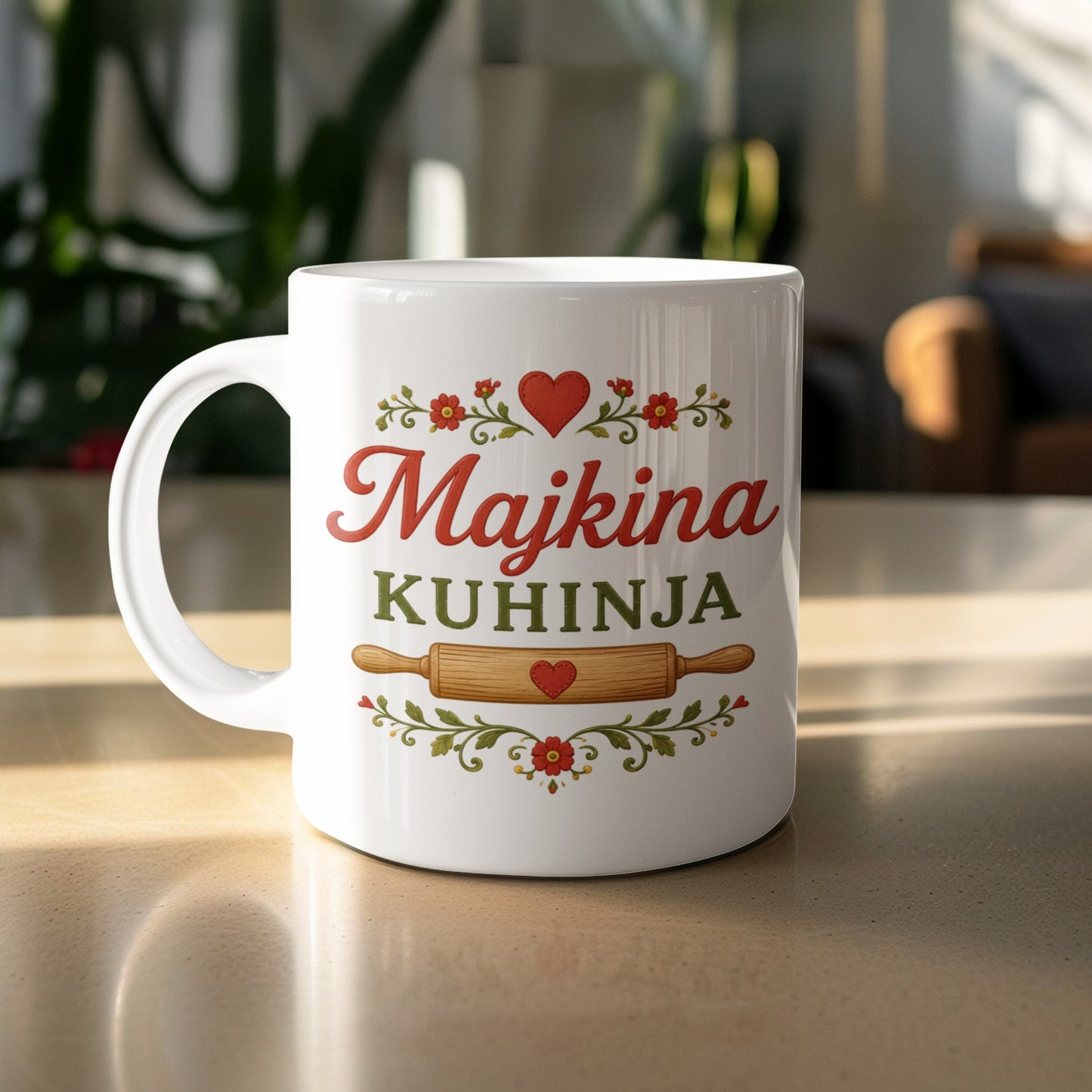 White mug with "Majkina KUHINJA" text, hearts, flowers and rolling pin design.