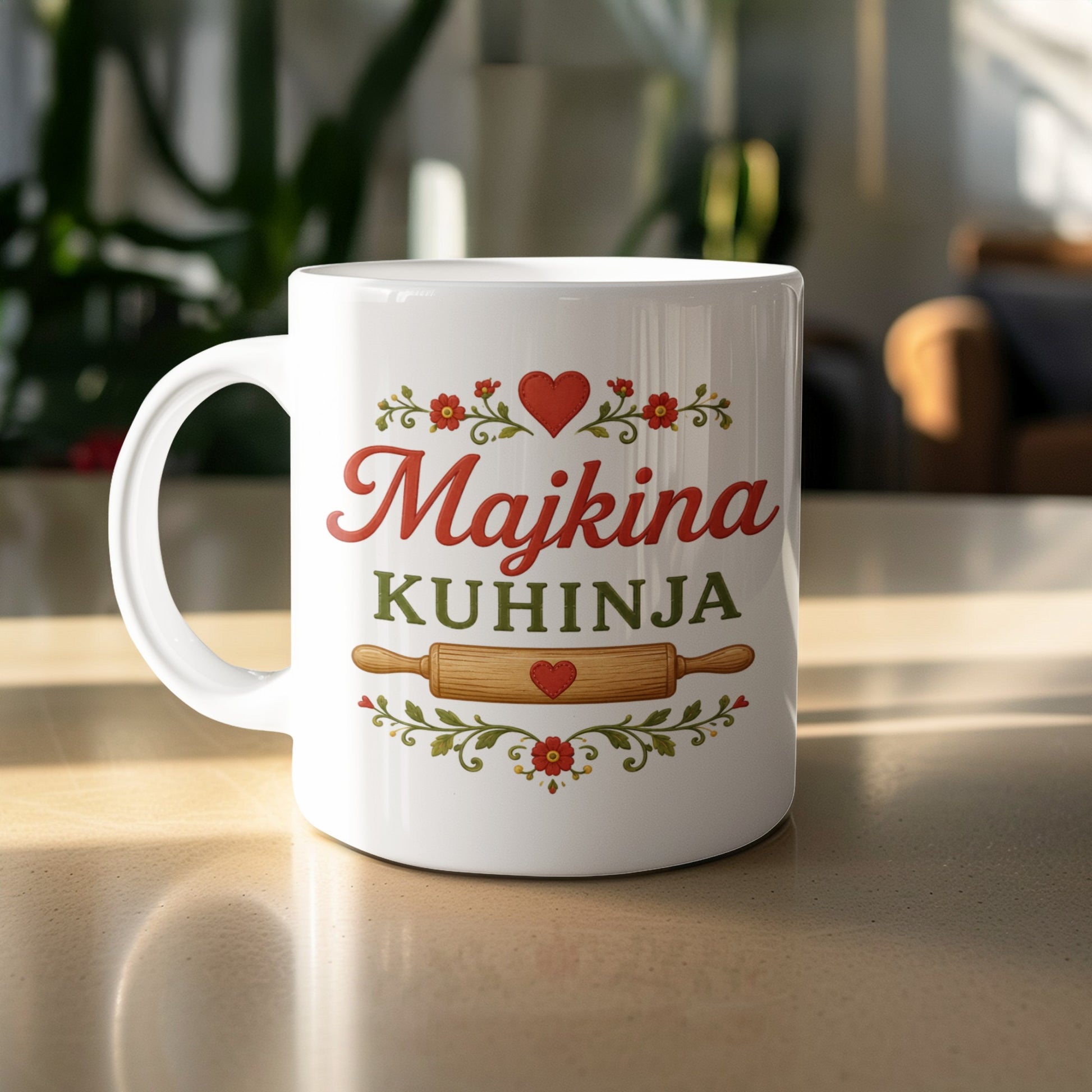 White mug with "Majkina KUHINJA" text, hearts, flowers and rolling pin design.